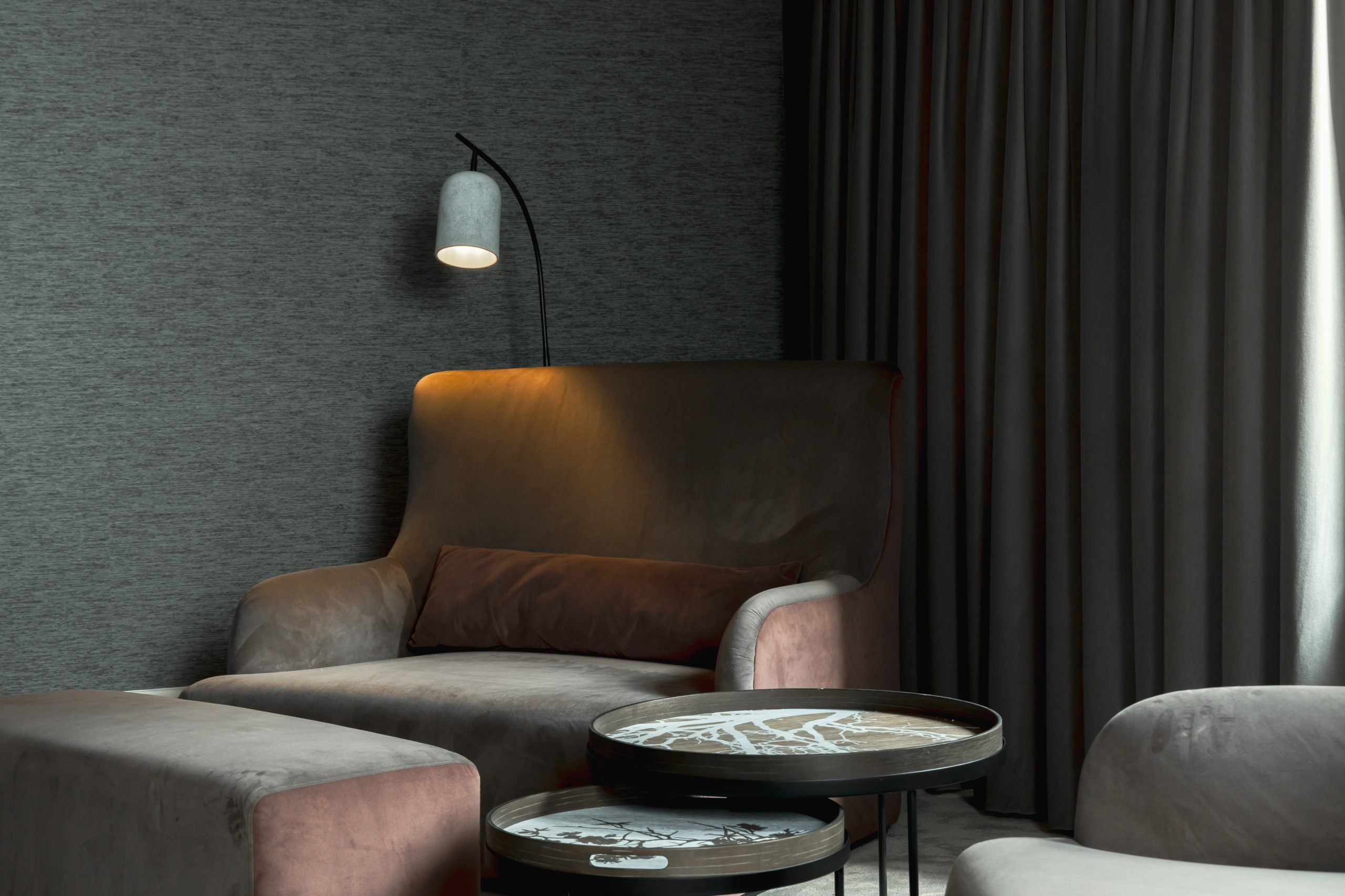 Elegant interior living room with statement art, neutral palette, and natural light