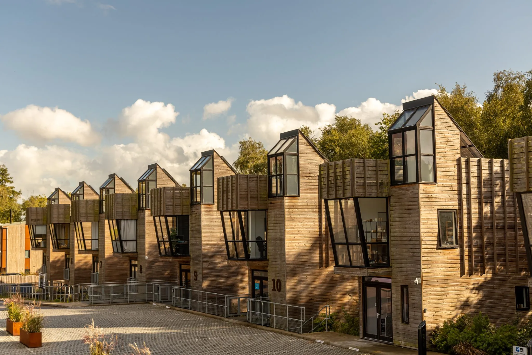 Sustainable timber-clad workspace buildings at Flimwell Park, a woodland development in East Sussex